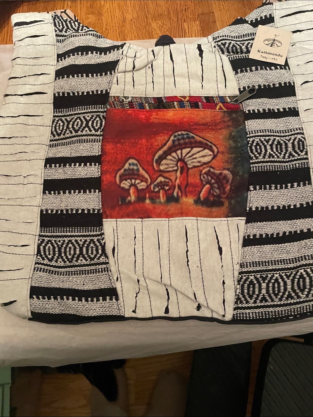 Kathmandu Traders Black & White Mushroom Tote Bag with Red Accent
